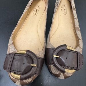 Coach flat slipped on